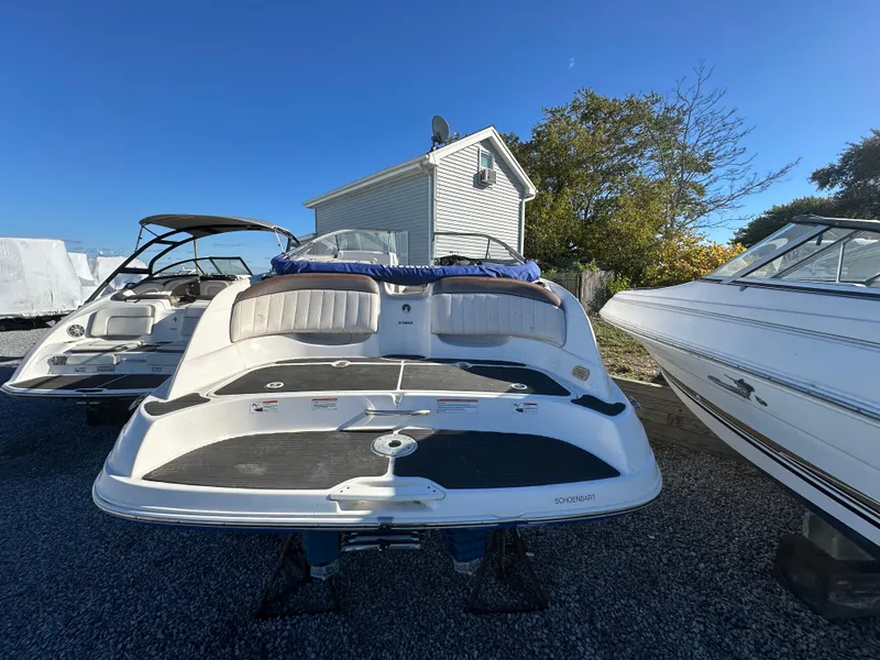 Slide: The Image of 2008 Yamaha Boats SX230 in storage, rear view, sunny day. - 4