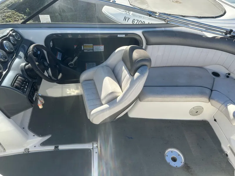 Slide: The Image of 2008 Yamaha Boats SX230 interior with steering wheel and seating area. - 8