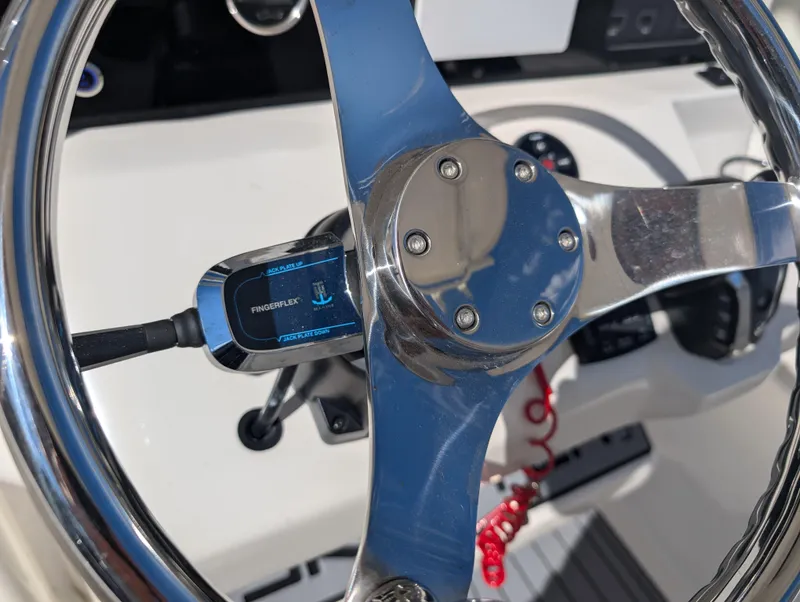 Slide: The Image of 2025 Skeeter SX 2550 Family boat steering wheel with digital display. - 20
