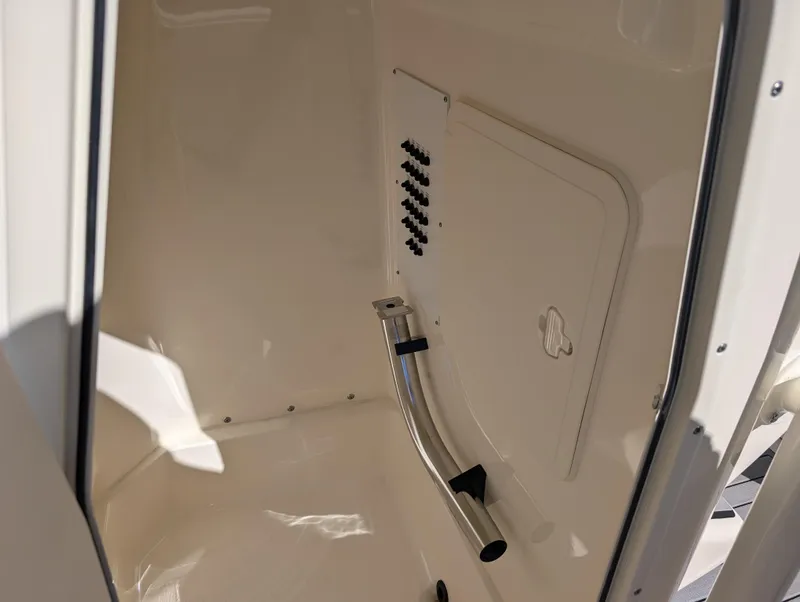 Slide: The Image of Interior of 2025 Skeeter SX 2550 Family boat, featuring storage compartment. - 22