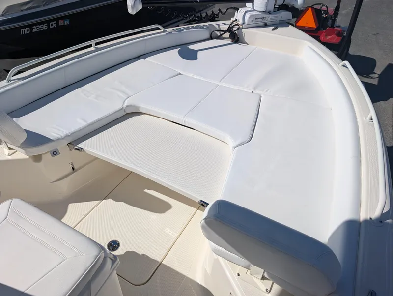 Slide: The Image of 2025 Skeeter SX 2550 Family boat with spacious white seating area. - 23