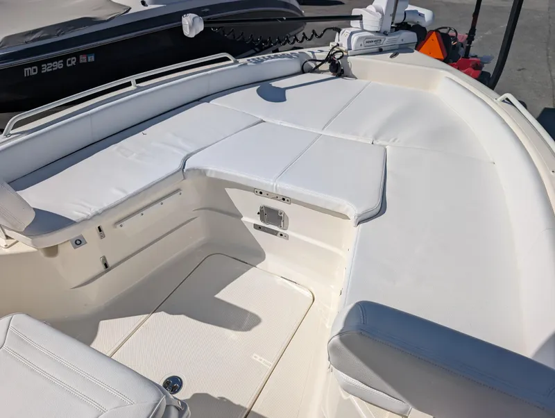 Slide: The Image of 2025 Skeeter SX 2550 Family boat with spacious white seating area. - 24