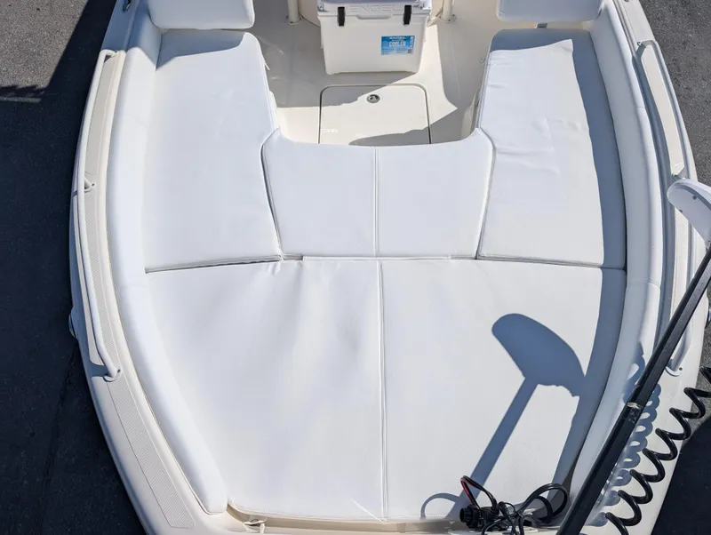 Slide: The Image of 2025 Skeeter SX 2550 Family boat with spacious white seating area. - 25