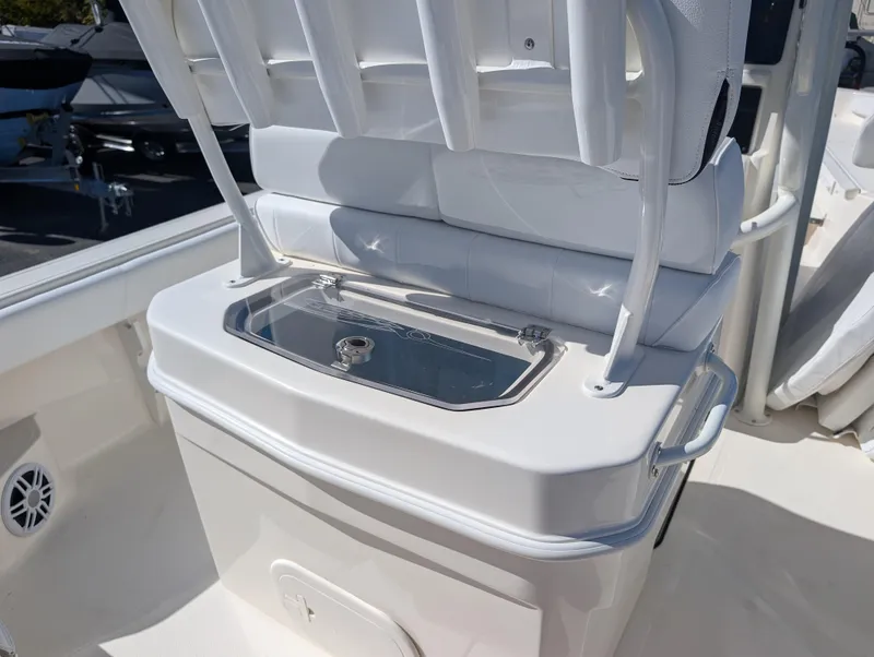 Slide: The Image of 2025 Skeeter SX 2550 Family boat interior with seating and storage. - 31