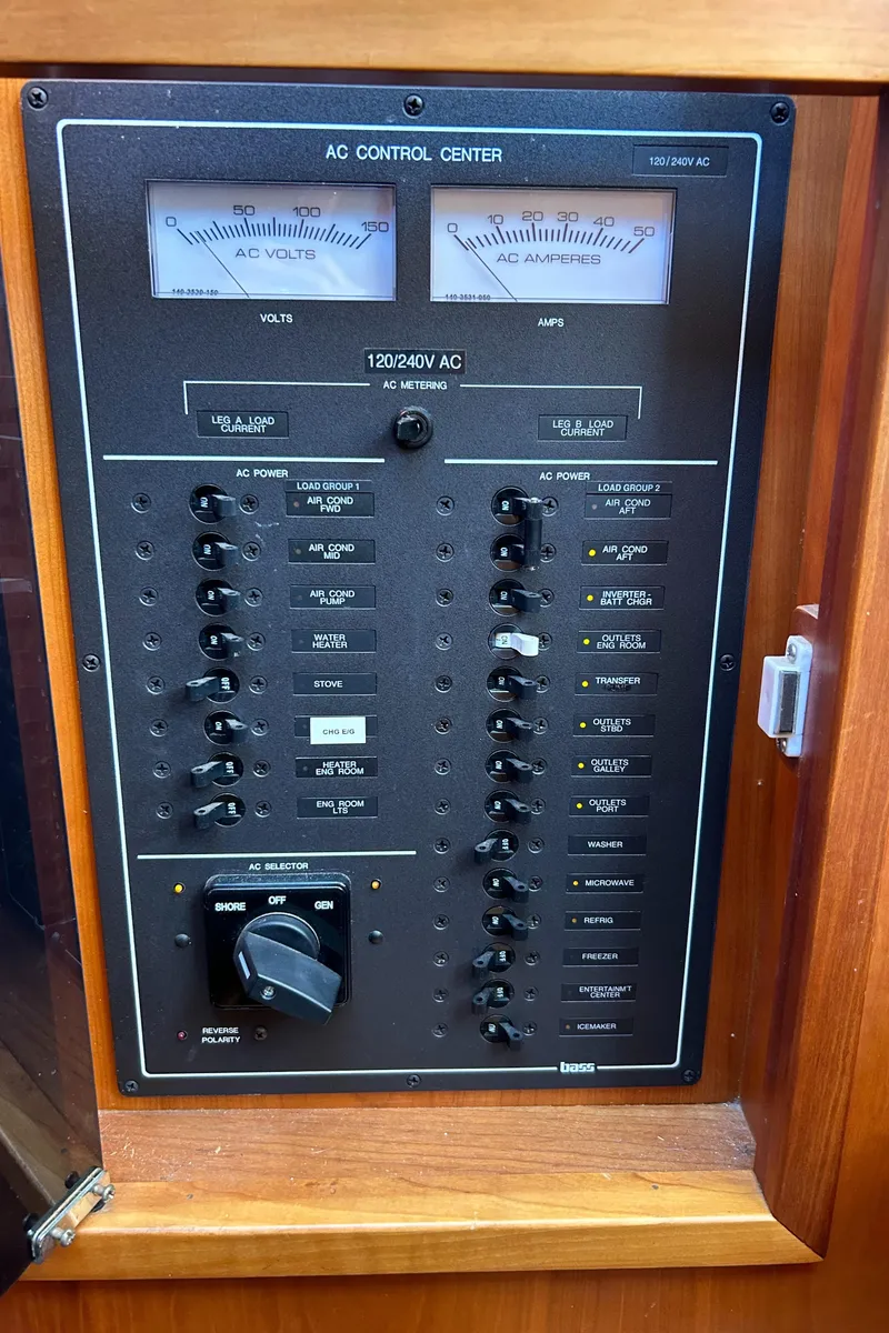 Slide: The Image of AC control panel on 2005 Sabre 42 Hardtop Express boat. - 18