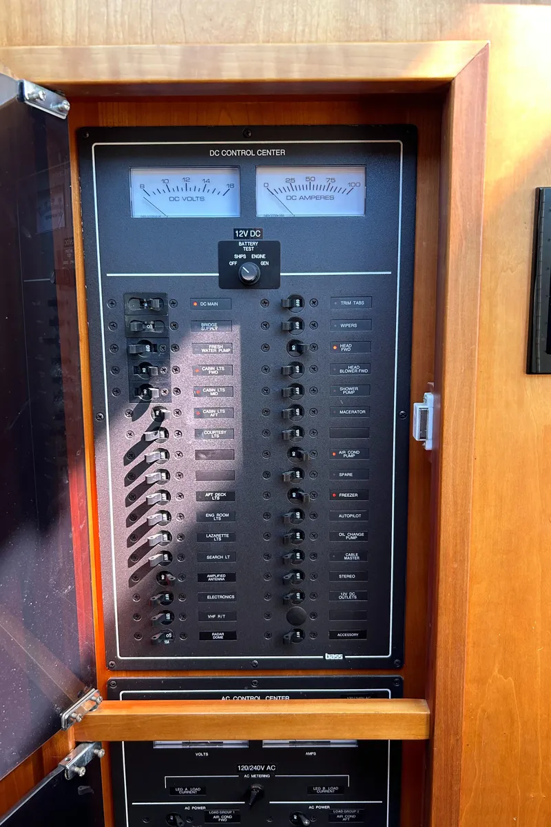 Slide: The Image of Electrical control panel on a 2005 Sabre 42 Hardtop Express yacht. - 19