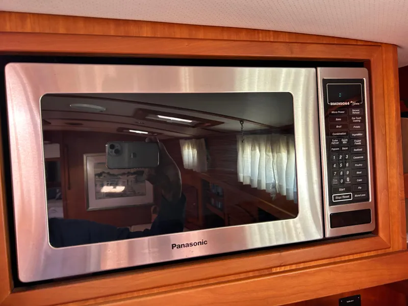 Slide: The Image of Panasonic microwave in 2005 Sabre 42 Hardtop Express yacht kitchen. - 22