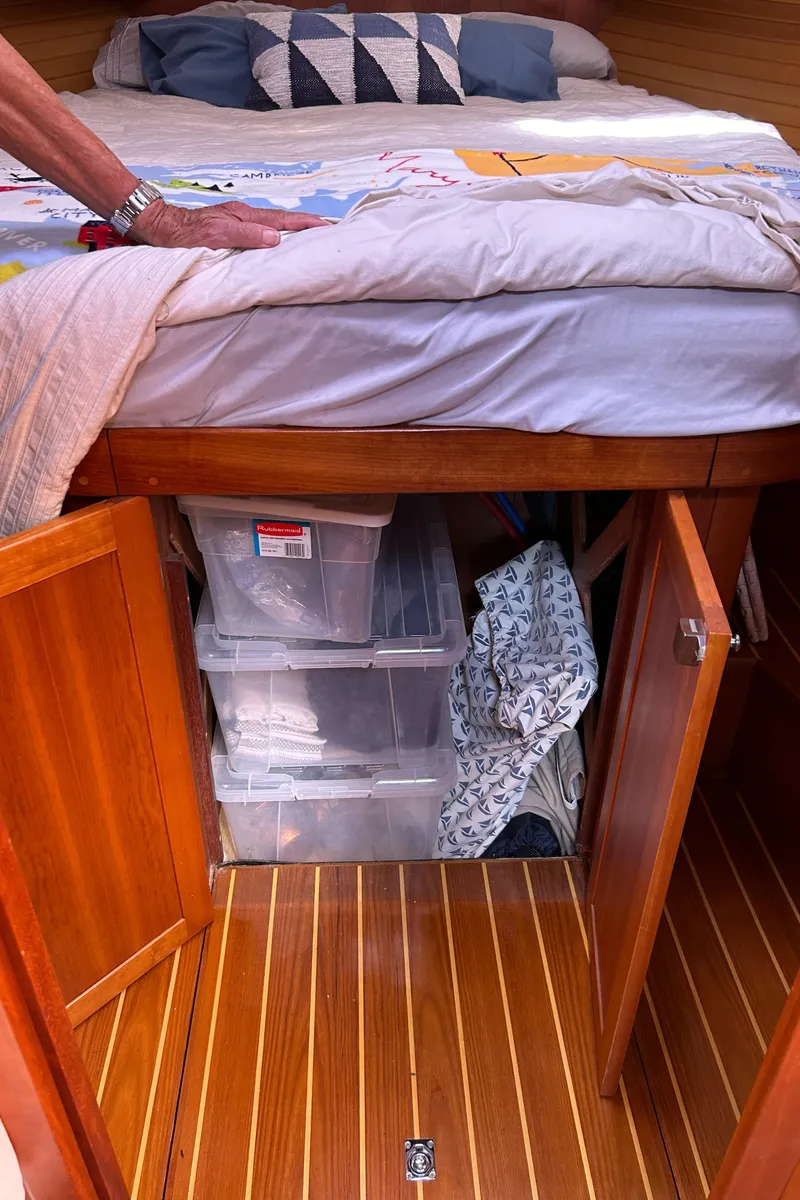 Slide: The Image of Storage area under bed in 2005 Sabre 42 Hardtop Express yacht. - 26