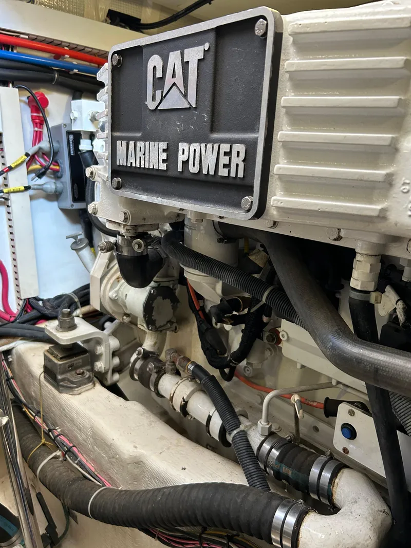 Slide: The Image of CAT Marine Power engine in 2005 Sabre 42 Hardtop Express yacht. - 32