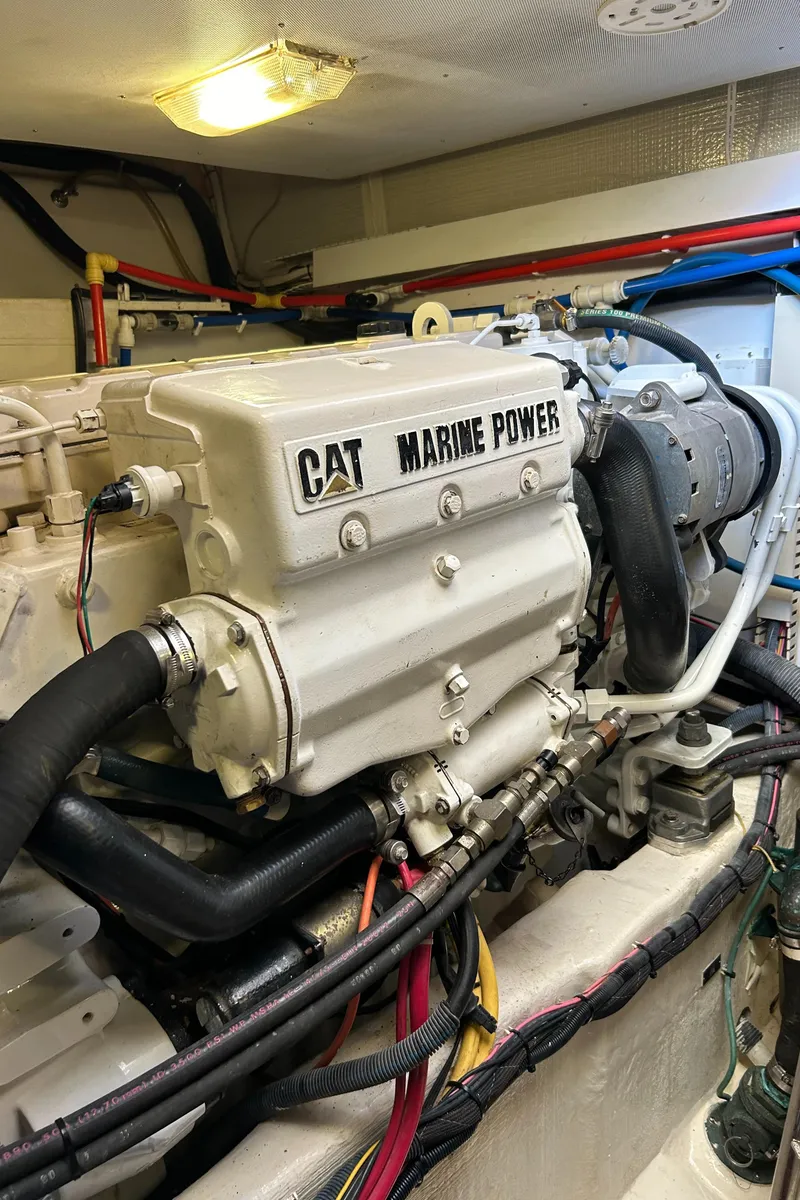 Slide: The Image of CAT Marine Power engine in 2005 Sabre 42 Hardtop Express yacht. - 34