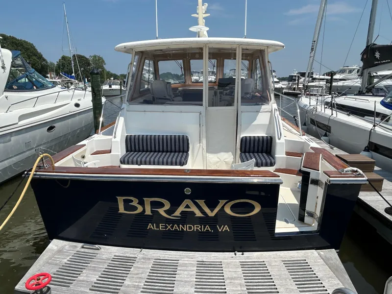 Slide: The Image of 2005 Sabre 42 Hardtop Express boat docked, named "Bravo" from Alexandria, VA. - 44
