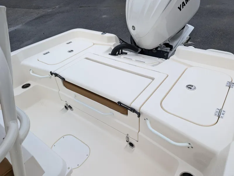 Slide: The Image of 2025 Skeeter SX 2350 boat deck with Yamaha engine, featuring storage compartments. - 10