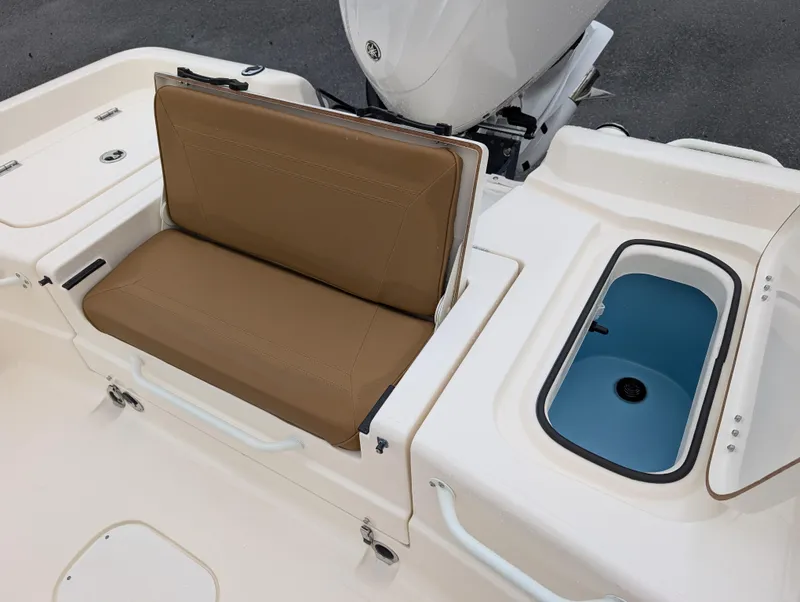 Slide: The Image of 2025 Skeeter SX 2350 boat with tan seat and livewell. - 12