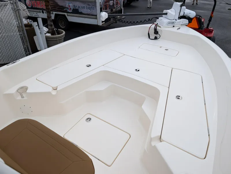 Slide: The Image of 2025 Skeeter SX 2350 boat deck with storage compartments and seating. - 18