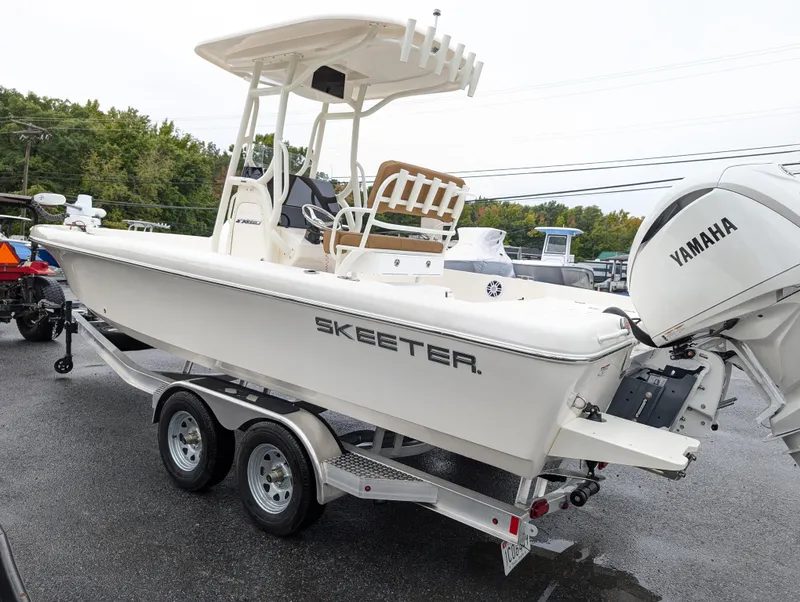 Slide: The Image of 2025 Skeeter SX 2350 boat with Yamaha engine on trailer. - 5
