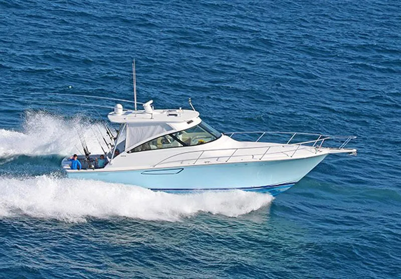 Slide: The Image of 2012 Viking 42 Open yacht cruising on the ocean. - 1