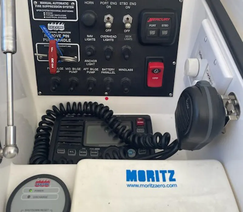 Slide: The Image of Control panel of a 2012 Viking 42 Open boat with communication equipment. - 14