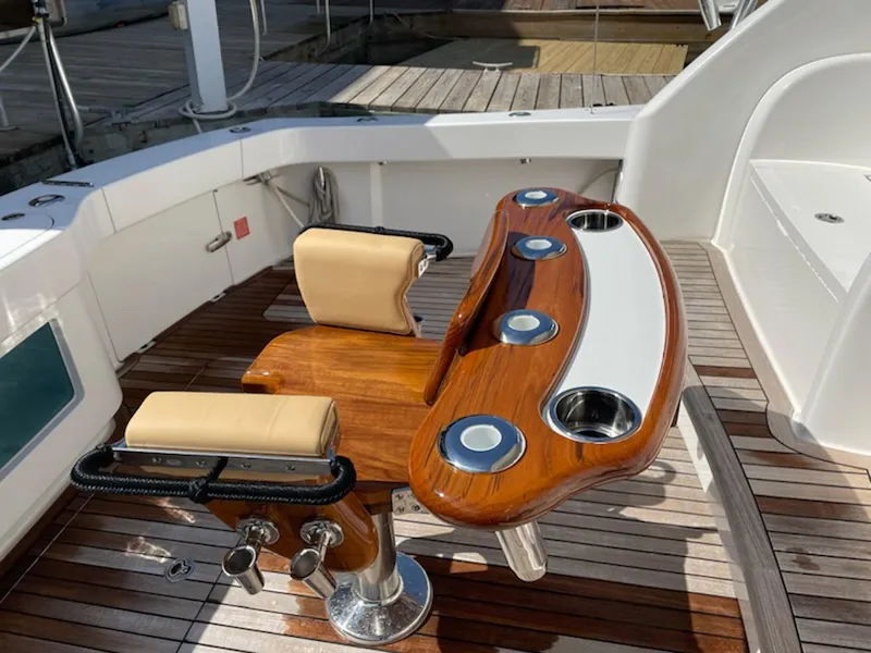 Slide: The Image of Viking 42 Open 2012 yacht cockpit with teak flooring and fishing chair. - 17