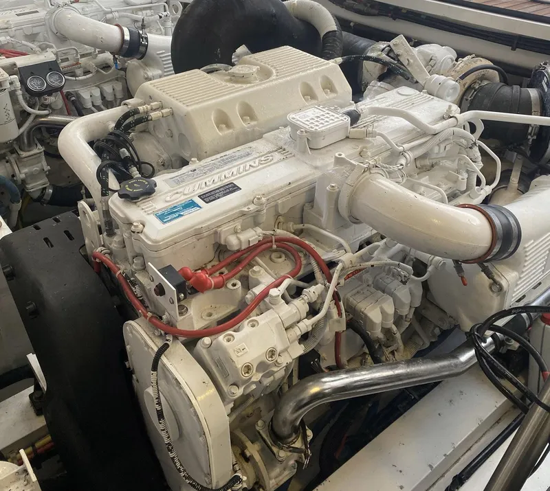 Slide: The Image of Engine of a 2012 Viking 42 Open boat, featuring detailed mechanical components. - 20