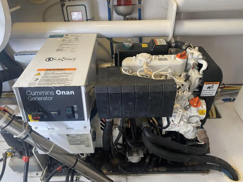 Slide: The Image of Cummins Onan generator in 2012 Viking 42 Open yacht engine room. - 23