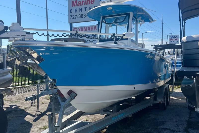Slide: The Image of 2020 Sea Hunt Gamefish 25 boat on trailer at marine center. - 1