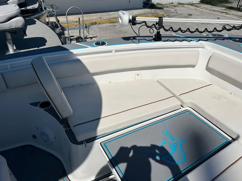 Slide: The Image of 2020 Sea Hunt Gamefish 25 boat interior with seating and fishing equipment. - 10