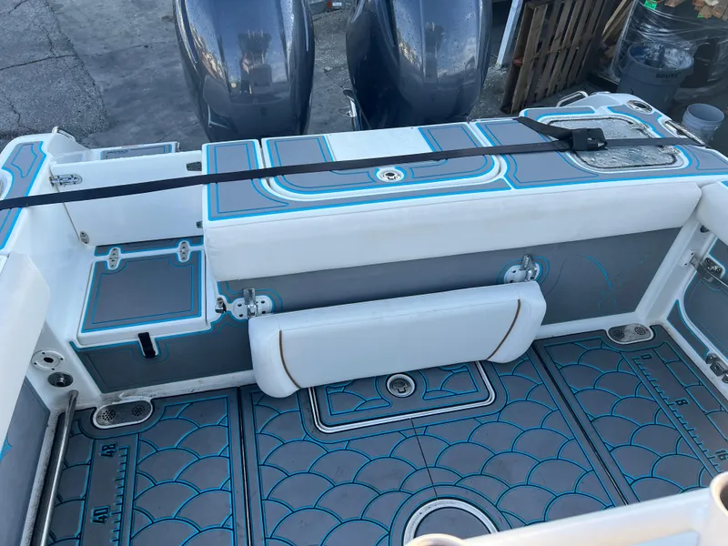 Slide: The Image of 2020 Sea Hunt Gamefish 25 boat interior with modern design and dual engines. - 11