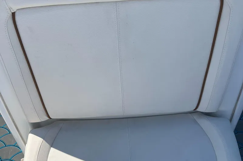 Slide: The Image of White cushioned seat on 2020 Sea Hunt Gamefish 25 boat. - 18