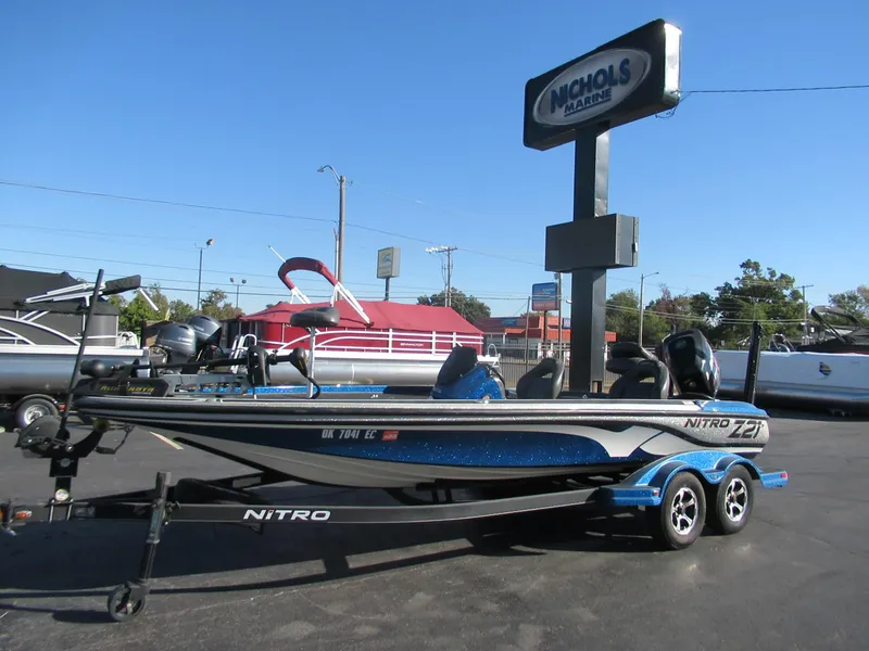 Slide: The Image of 2016 Nitro Z21 boat on trailer at Nichols Marine dealership. - 1