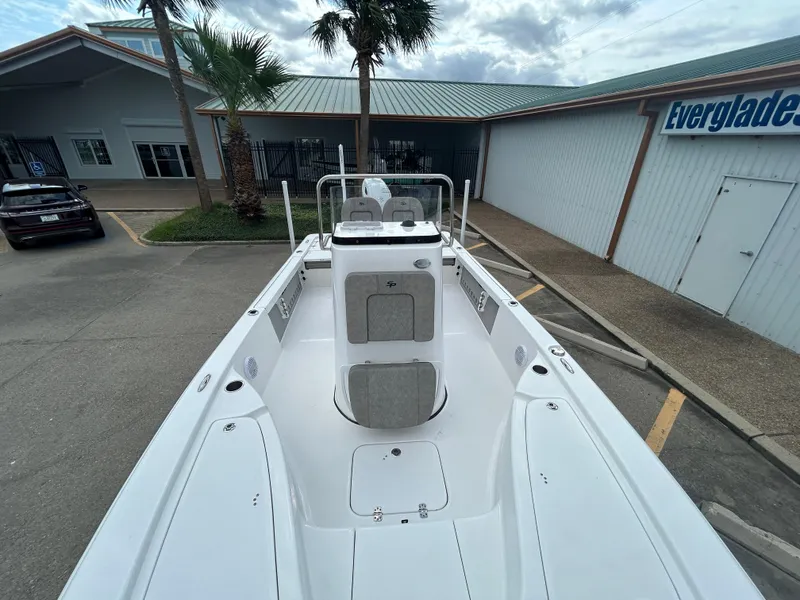 Slide: The Image of 2025 Sea Pro 230 Bay boat console with steering wheel and controls. - 15