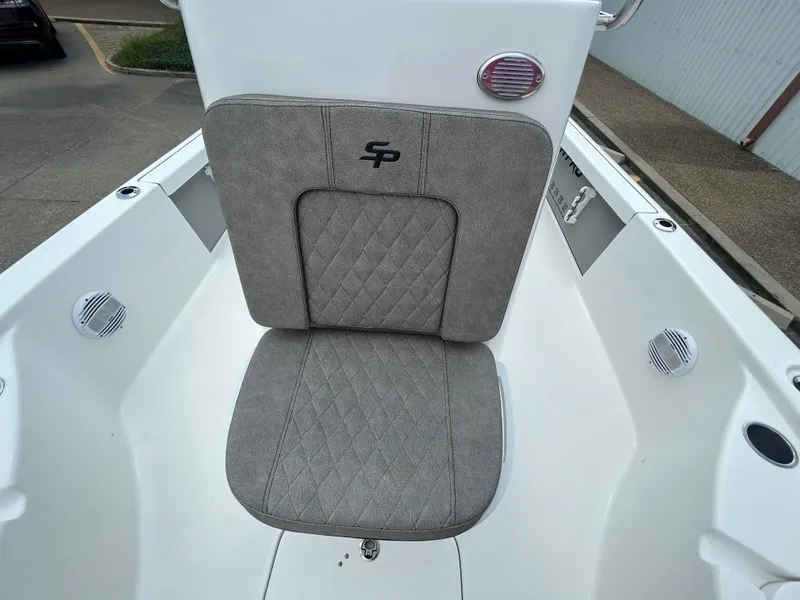 Slide: The Image of 2025 Sea Pro 230 Bay boat deck with multiple storage compartments. - 16