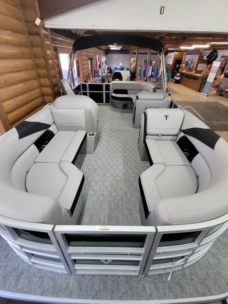 Slide: The Image of 2025 Trifecta 22TRC2LE275 pontoon boat with spacious seating and modern design. - 4