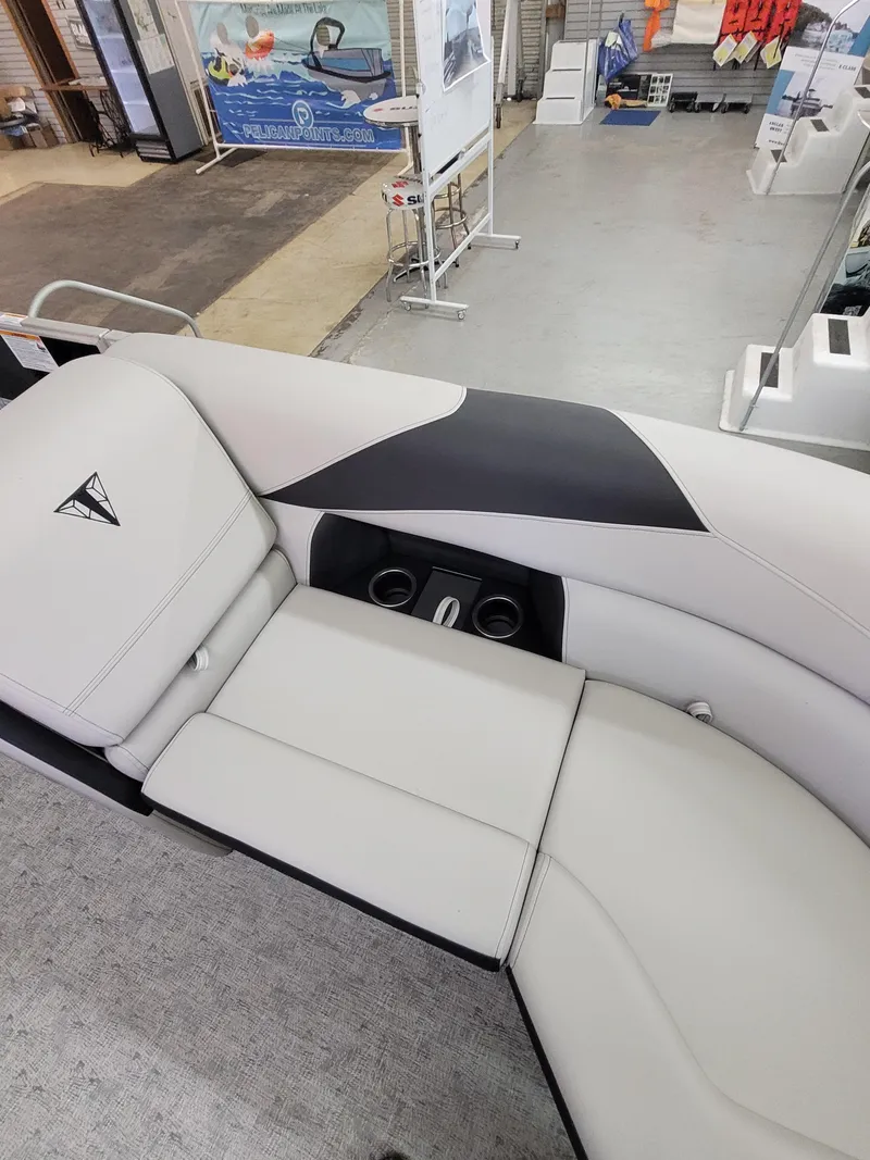 Slide: The Image of Luxurious seating on 2025 Trifecta 22TRC2LE275 pontoon boat with cup holders. - 5