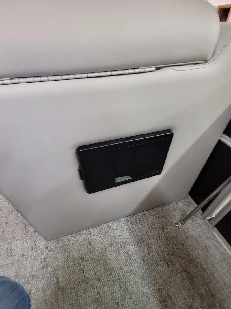 Slide: The Image of 2025 Trifecta 22TRC2LE275 interior with sleek, modern seating and integrated storage. - 6