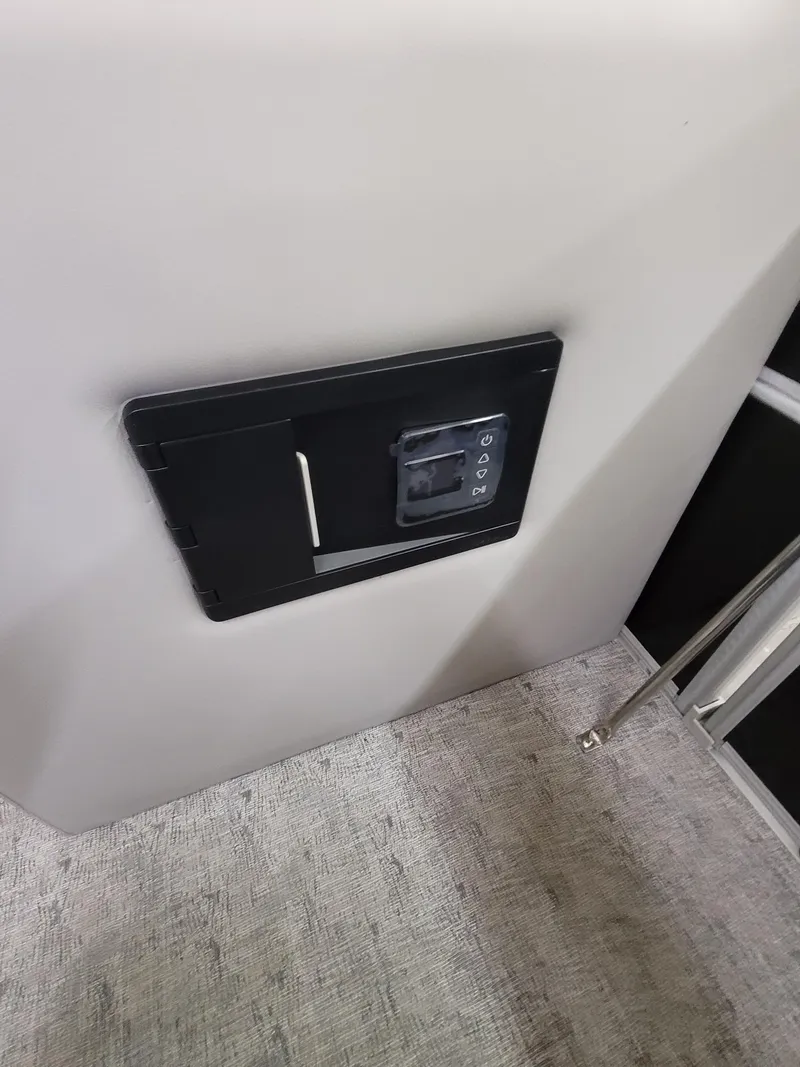 Slide: The Image of 2025 Trifecta 22TRC2LE275 interior panel with control interface. - 7