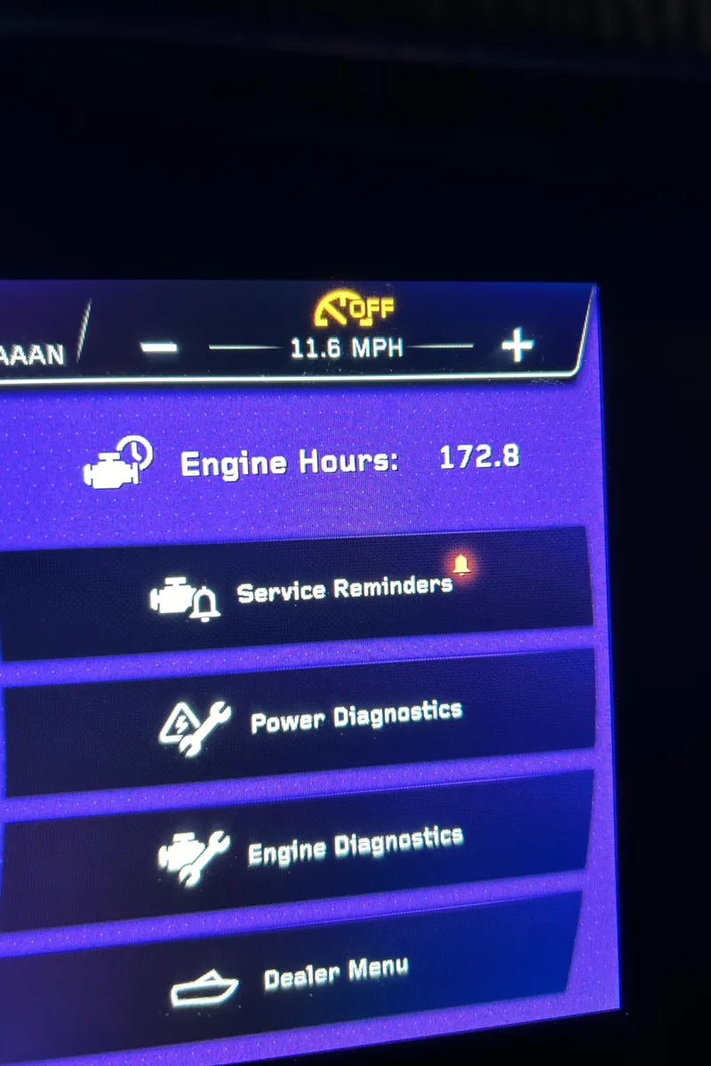 Slide: The Image of 2022 Nautique Super Air Nautique G25 dashboard displaying engine hours and diagnostics. - 23