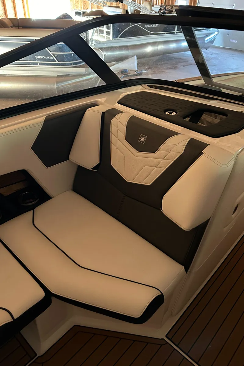 Slide: The Image of 2022 Nautique Super Air Nautique G25 interior seating with modern design and premium materials. - 24