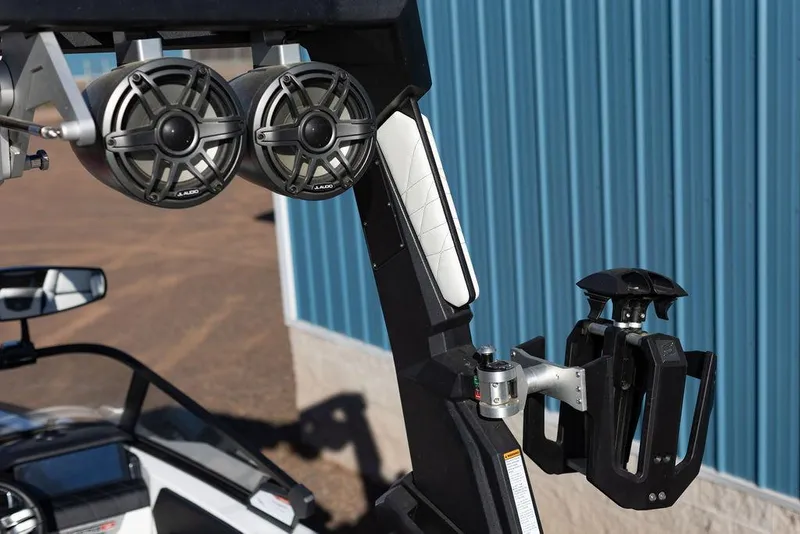 Slide: The Image of 2022 Nautique Super Air Nautique G25 boat speakers and wakeboard rack detail. - 6