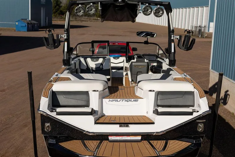Slide: The Image of 2022 Nautique Super Air Nautique G25 boat with sleek design and spacious interior. - 9