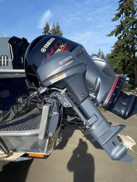 Slide: The Image of Yamaha 150hp with 9.9 Kicker  - 11