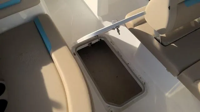 Slide: The Image of 2025 Hurricane SunDeck Sport 205 OB boat interior storage compartment. - 25