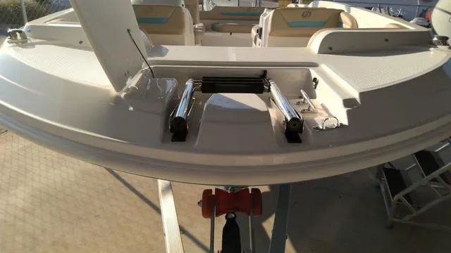 Slide: The Image of 2025 Hurricane SunDeck Sport 205 OB boat, rear view with seating and deck details. - 3