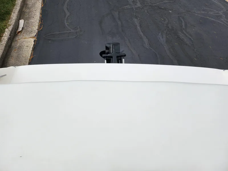 Slide: The Image of 2006 Glastron SX 195 boat on a trailer, viewed from the rear. - 24