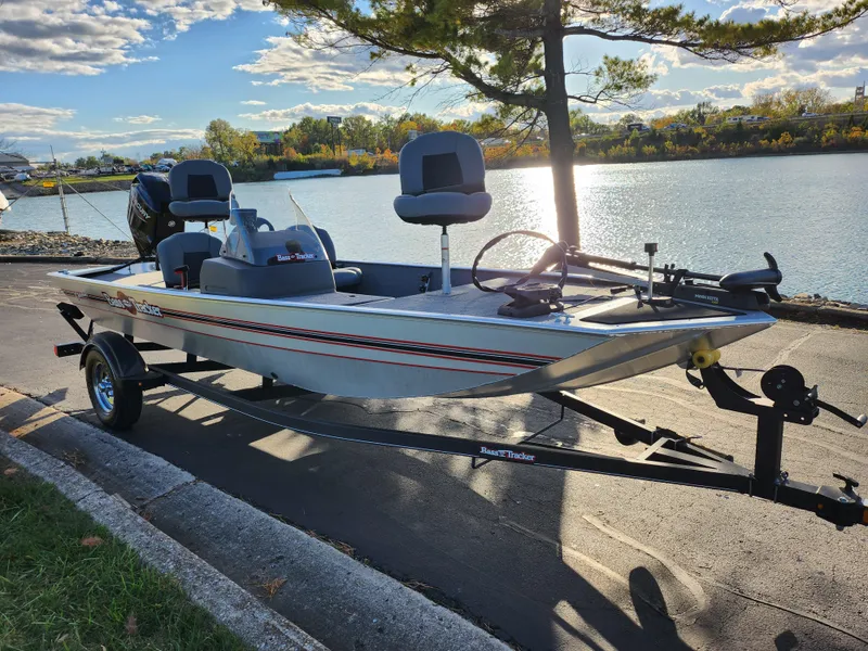 Slide: The Image of 2020 Tracker Bass Tracker Classic XL boat on trailer by a scenic lake. - 10