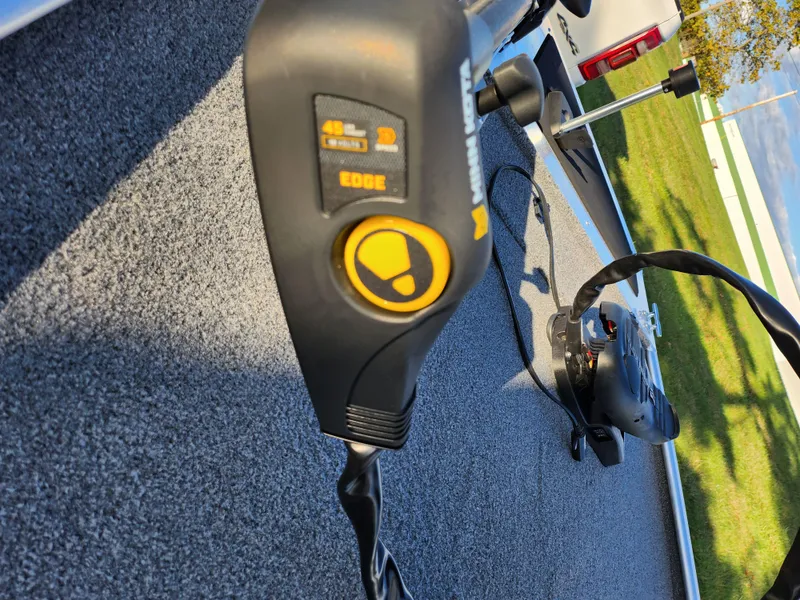 Slide: The Image of Close-up of a 2020 Tracker Bass Tracker Classic XL boat control panel. - 18