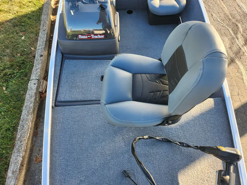 Slide: The Image of 2020 Tracker Bass Tracker Classic XL boat interior with gray seating and carpet. - 19