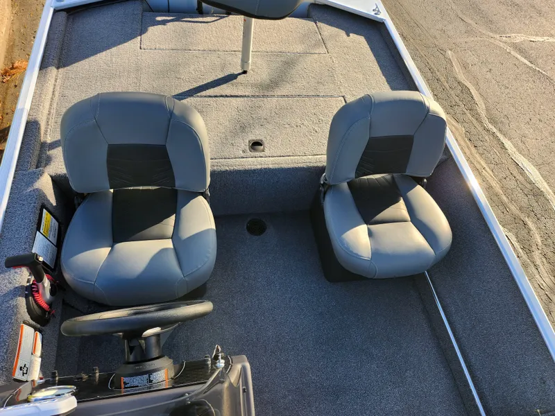 Slide: The Image of 2020 Tracker Bass Tracker Classic XL boat interior with two gray seats. - 21