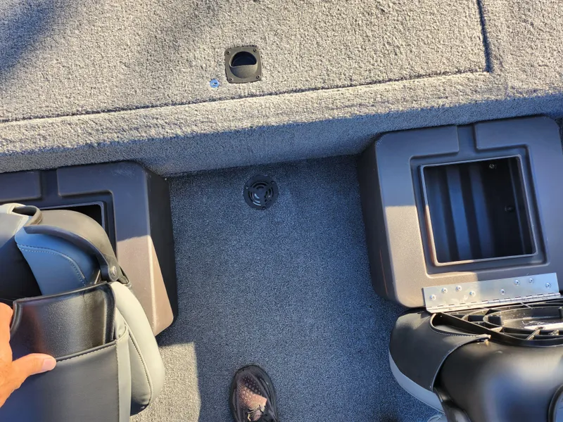 Slide: The Image of 2020 Tracker Bass Tracker Classic XL boat interior with seating and storage compartments. - 22