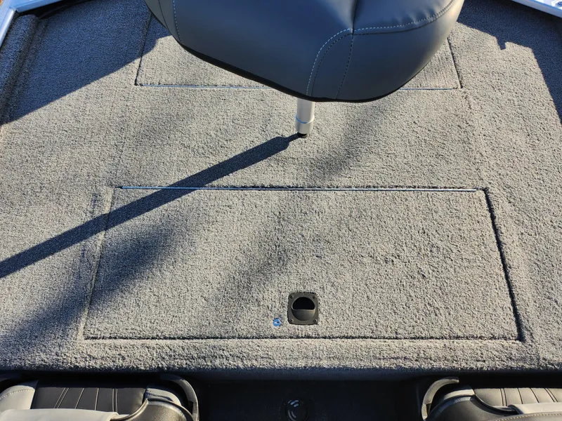 Slide: The Image of 2020 Tracker Bass Tracker Classic XL boat interior with carpeted deck and seat. - 23