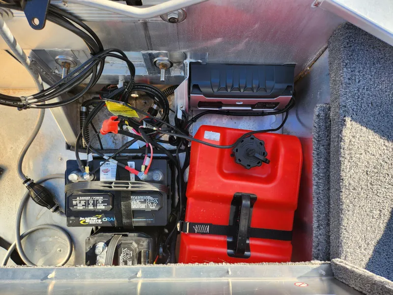 Slide: The Image of 2020 Tracker Bass Tracker Classic XL boat battery and fuel tank compartment. - 26